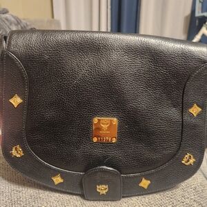 MCM Black Crossbody Bag with Gold Accents
